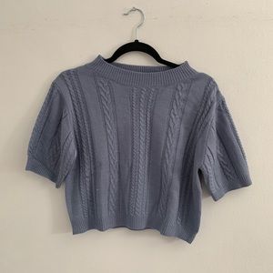 blue knit shirt